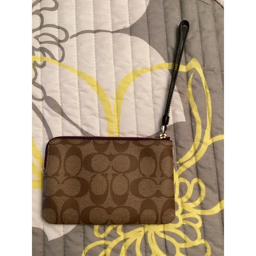NWOT Disney x Coach Corner Zip Wristlet Signature Canvas with Bad Girls Patches